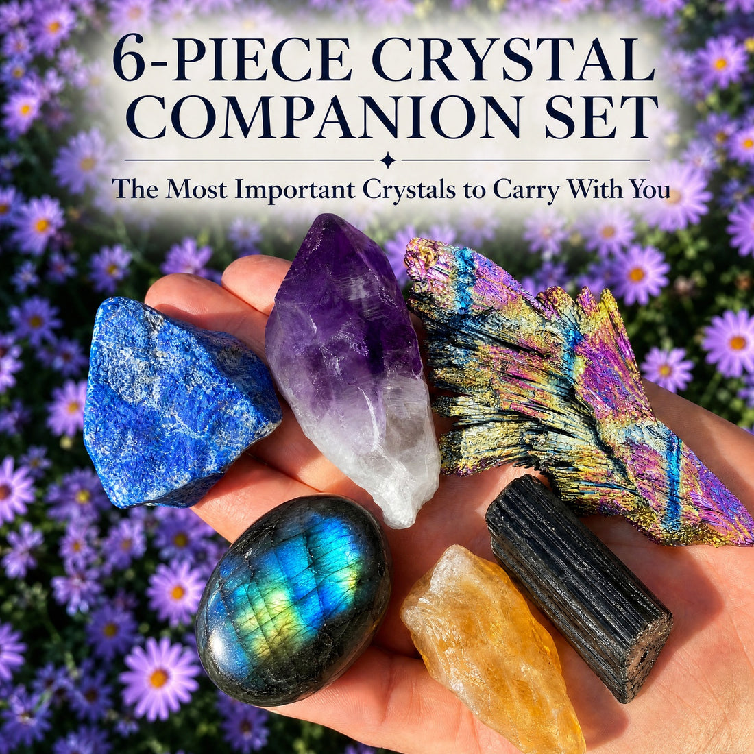 All six crystals of the set held together in one open hand: lapis lazuli, amethyst, peacock kyanite, labradorite, citrine and tourmaline