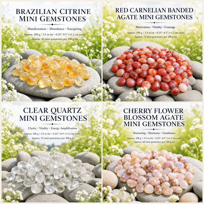 Piles of Brazilian citrine, carnelian agate, clear quartz and flower cherry agate mini gemstones on grey stones