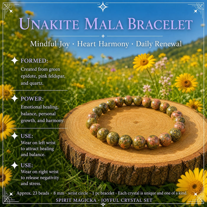 An unakite bead mala bracelet laid in a circle on a wooden slice