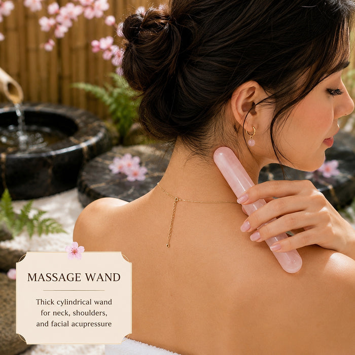 A woman pressing the rounded rose quartz massage wand against the back of her neck