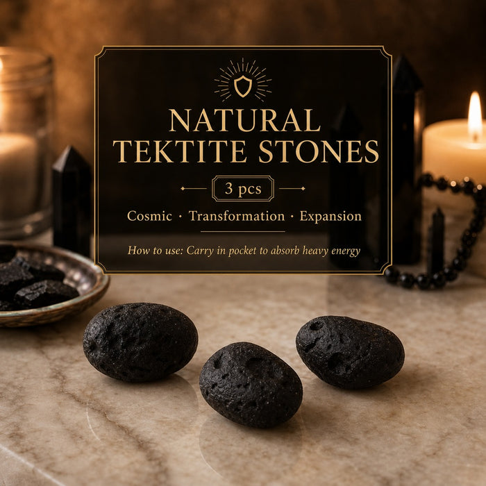 Three pitted black natural tektite stones