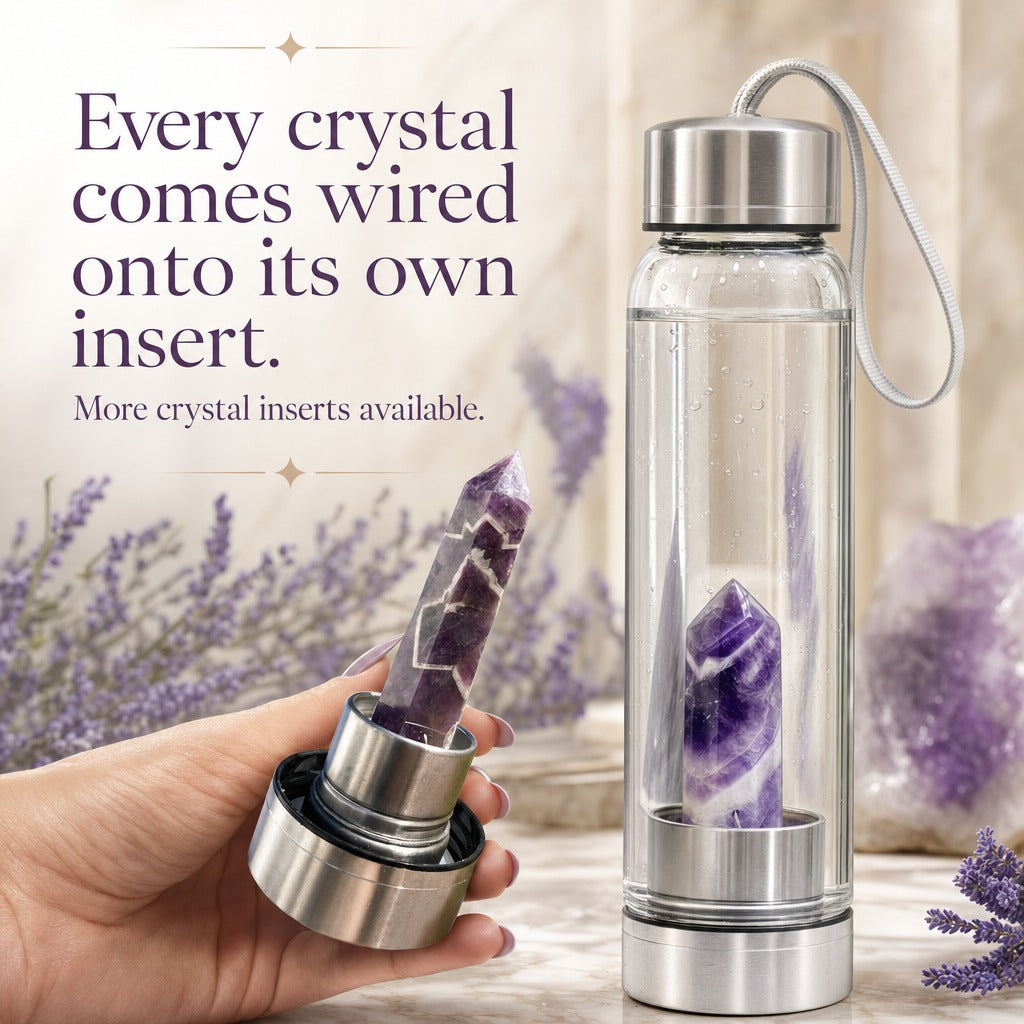 A hand holding a spare chevron amethyst point on its steel insert base beside a bottle with an amethyst insert inside