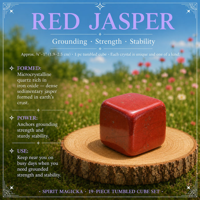 Red Jasper tumbled cube on a wooden round in a wildflower meadow